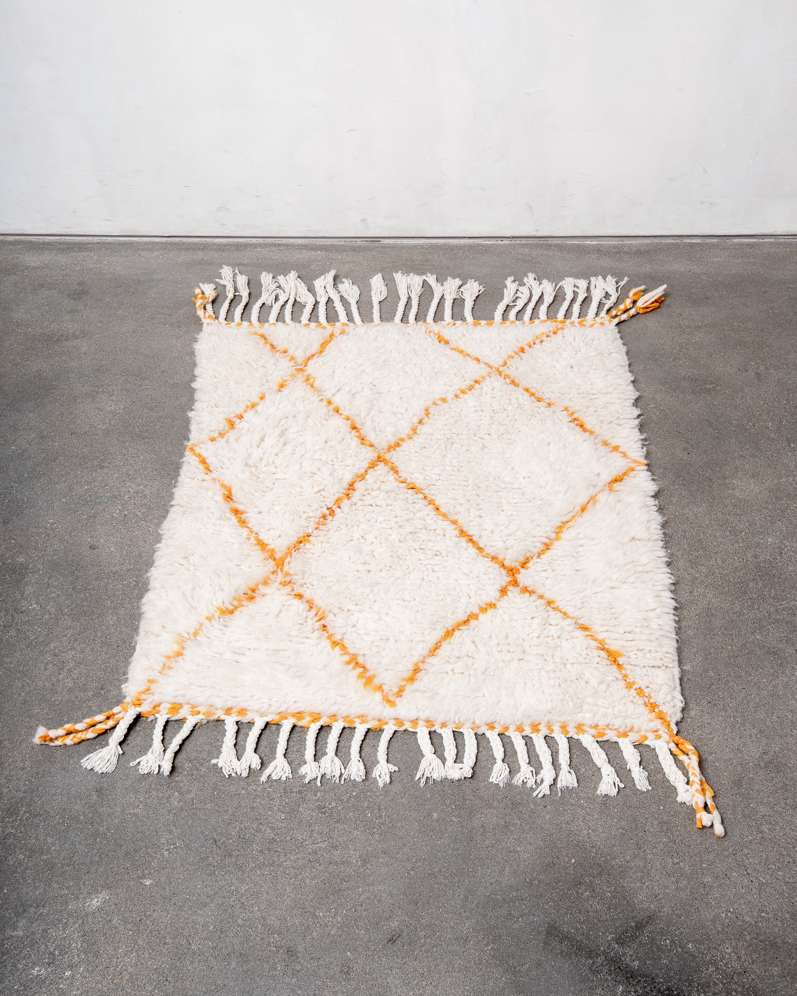 Modern, designer, handcrafted Berber rug from Morocco. Beniourain carpet with beautiful colours and patterns and fluffy wool texture.